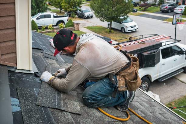 Professional Emergency Roof Repair technician working in Carver, MA